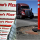 Illustration for article titled Domino’s offers to fix your town’s pothole epidemic